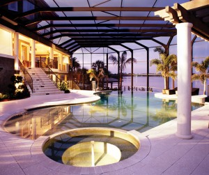 Luxury Residential Watefront Pool & spa lit at night