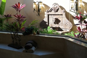 Indoor outdoor bath with custom fountain