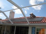 solar heating system for residential swimming pool mounted on tile roof