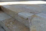 Travertine tile step detail with overhang